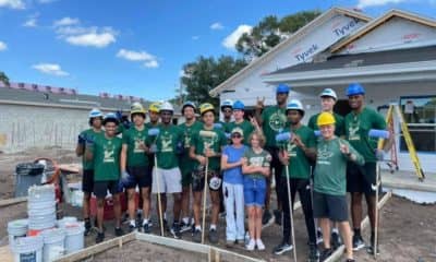 USF men’s basketball team assists Habitat for Humanity on ‘extra special’ home
