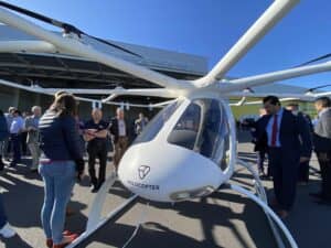 Guests circle the Volocopter after the flight demonstration. Photo by Veronica Brezina. 