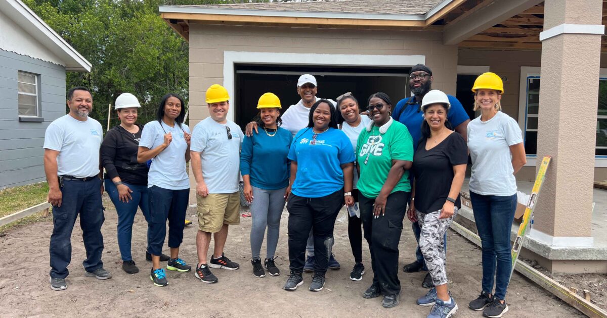 St. Petersburg Housing Authority Team Volunteers on Habitat for